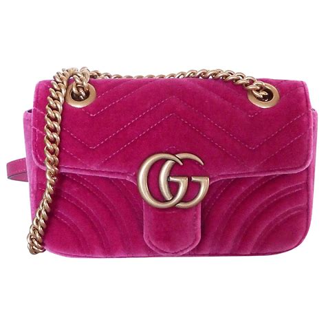 gucci pink velvet bag.